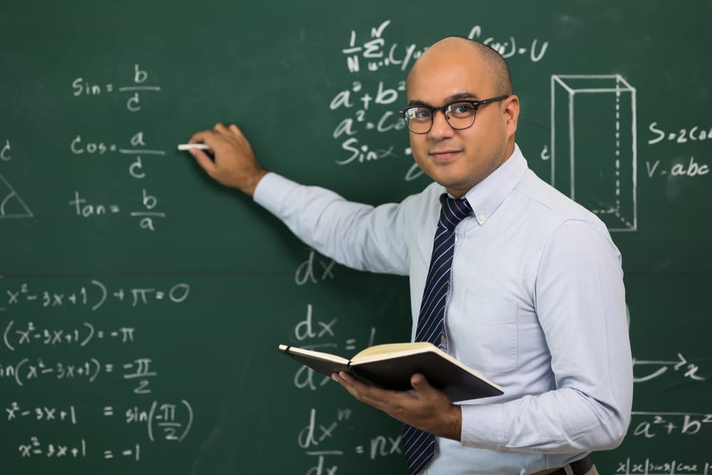 Young,Asian,Teacher,Man,Teaching,Video,Conference,With,Student.,Male